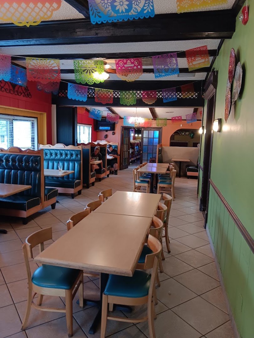 Mexican restaurant dining room with tables and chairs